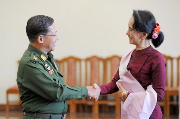 | In this file photo dated Dec 2 2015 Myanmar military chief General Min Aung Hlaing L and National League for Democracy party leader Aung San Suu Kyi R shake hands after their meeting at the Commander inChiefs office in Naypyidaw | MR Online