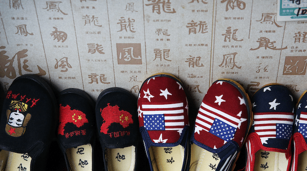 | Chinese made childrens shoes embroidered with Chinese maps and US flags are on display at a shop in Beijing Andy Wong | AP | MR Online