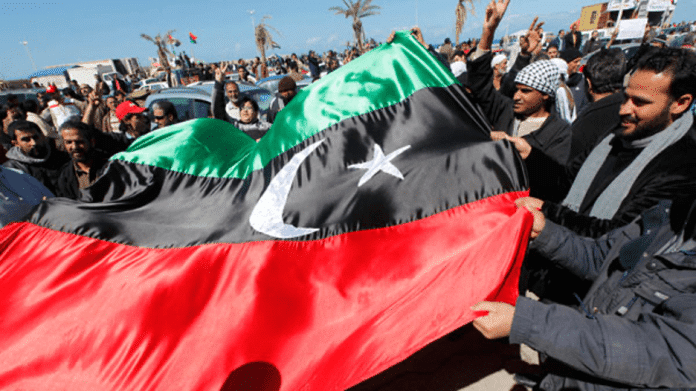  | Protesters in Benghazi hoist pre revolutionary Libyan flag Source kentonxtfileswordpresscom | MR Online