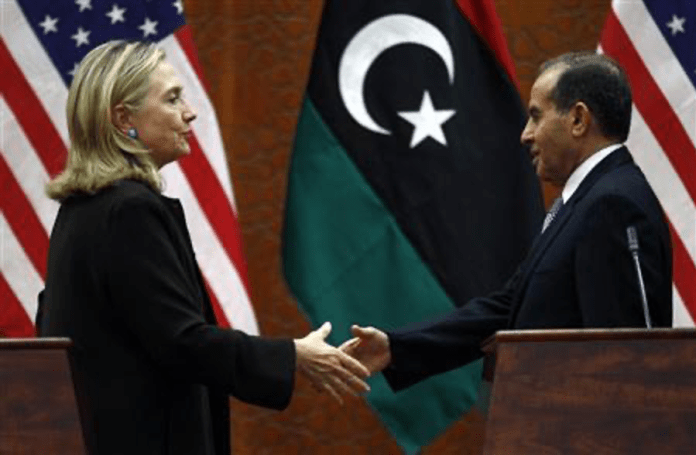  | Clinton shakes hands with Jibril on October 18 2011 at the World Islamic Call Society headquarters during Clintons visit to Libya On the eve of the US NATO bombing Clinton had met with Jibril in the company of French intellectual gadfly Bernard Henri Lévy and voiced support for him Source reuterscom | MR Online