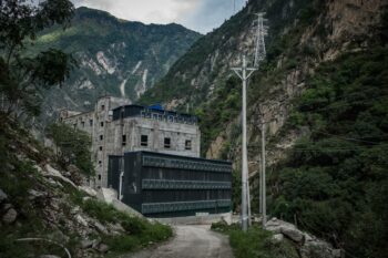 | An exterior view of a bitcoin mine near a hydropower station in rural Sichuan province 2016 Liu XingzhePeople Visual | MR Online