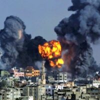 | In this July 22 2014 file photo smoke and fire from a devastating Israeli airstrike rise over Gaza City during the holy month of Ramadan Photo by Hatem Moussa | MR Online
