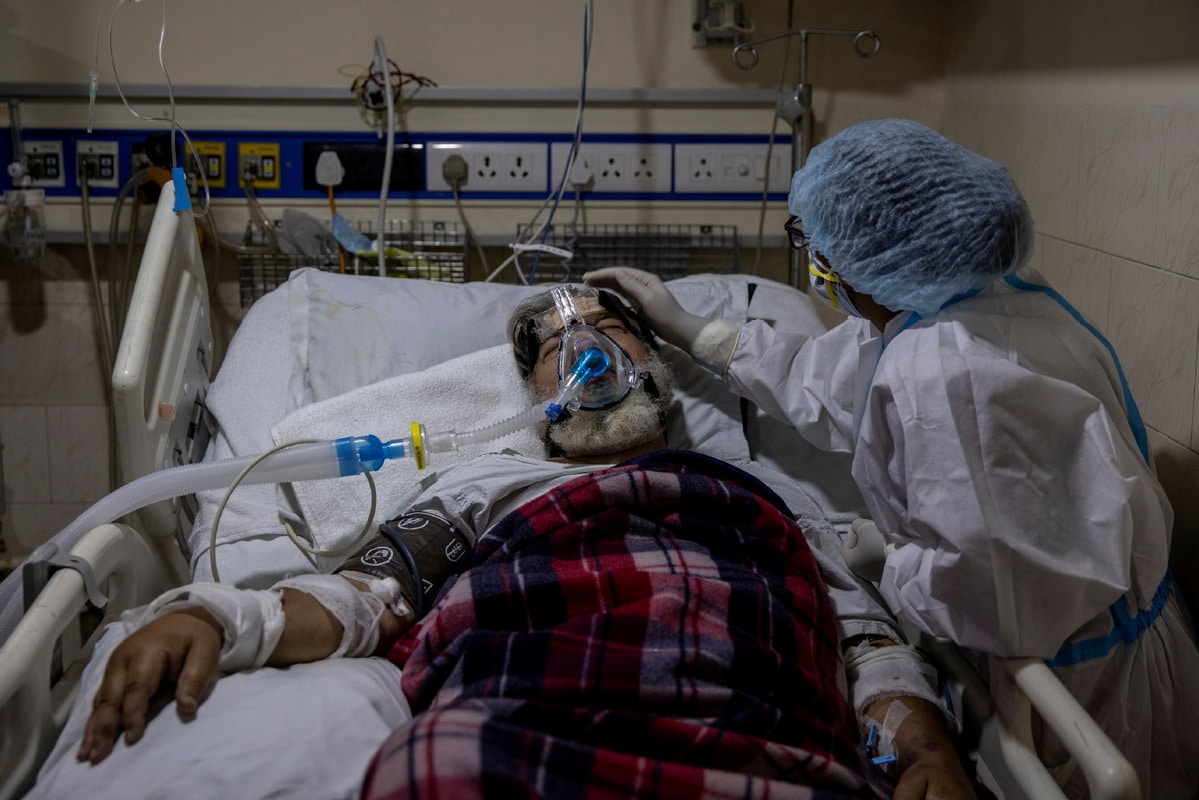 | A medical worker tends to a patient suffering from the coronavirus disease COVID19 inside the ICU ward at a hospital in New Delhi India April 29 2021 | MR Online