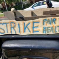 | Placard from a IATSE solidarity rally in Los Angeles | MR Online