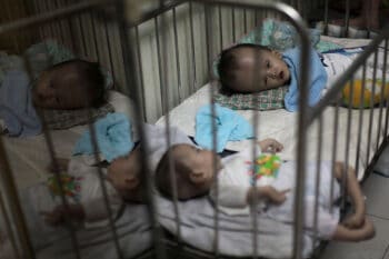 Two babies with birth defects caused by Agent Orange exposure are abandoned at a temple in Ho Chi Minh City, Vietnam, July 25, 2011. /CFP