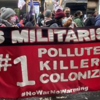 Peace and environmental activists brought the question of the role of the military in causing climate change to the fore even while it was ignored by the official COP26 summit.