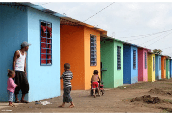 Families moving into government-built houses in Cuidad Belen.