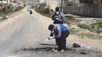 | Two men collecting samples from scene of alleged chemical attack with almost no protection | MR Online