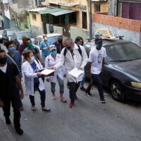 Cuban volunteer doctors visit a slum in Caracas, Venezuela, April 2020