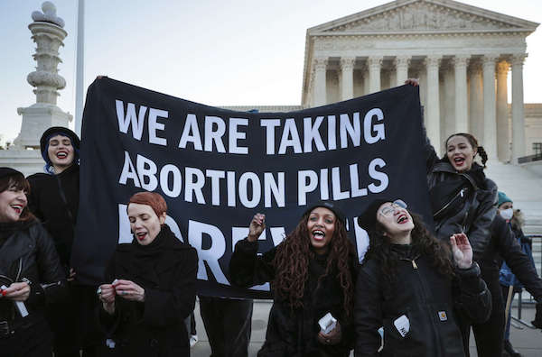 | Protesters gather in front of the US Supreme Court as the justices hear arguments in Dobbs v Jackson Womens Health a case about a Mississippi law that bans most abortions after 15 weeks on December 1 2021 in Washington DC | MR Online