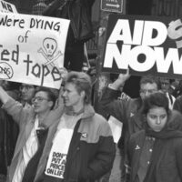 Demonstrators at the intersection of Trinity Place and Rector Street on March 24 1988.