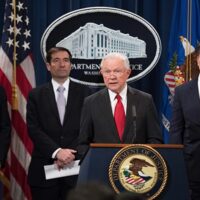 Then-Attorney General Jeff Sessions, center, announces the creation of a controversial Justice Department effort called the “China Initiative”during a press conference at the Justice Department in Washington, D.C., on Nov. 1, 2018.