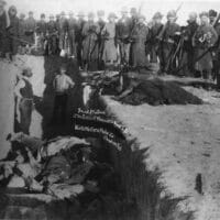 | Burial of the dead after the massacre of Wounded Knee in South Dakota US Soldiers are shown putting Indians in a common grave some corpses are frozen in different positions Source wikipediaorg | MR Online