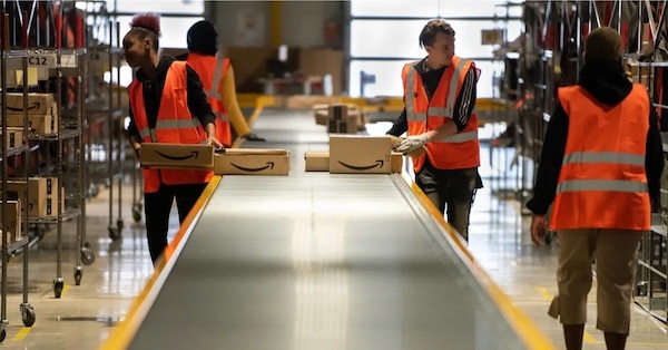 | Not everyone smilingAmazon workers at Vélizy Villacoublay in France Frederic LegrandCOMEO shutterstockcom | MR Online