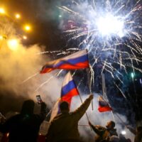 | People wave Russian national flags celebrating Moscows recognition Donetsk and Lugansk eastern Ukraine Feb 21 2022 | MR Online