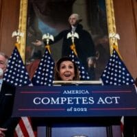 | House Speaker Nancy Pelosi along with Rep Richard Neal DMA and Rep Eddie Bernice Johnson DTX speaking about the America COMPETES Act in the US Capitol on Feb 4 The Act continues the United States policy of militarism first and poor and workingclass people last DREW ANGERERGETTY | MR Online