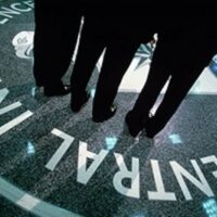 Government employees gather around a seal inside the CIA in McLean, Virginia. (Brooks Kraft LLC/Corbis via Getty Images)