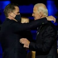 | President Joe Biden embraces his son Hunter Biden L on stage after delivering remarks in Wilmington Delaware on November 7 2020 | MR Online