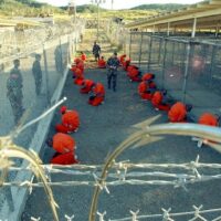 January 11, 2002 shows the first 20 prisoners to Guantanamo Bay