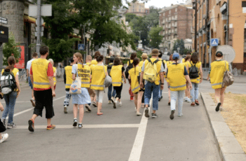 CCL staffers with yellow vests out to investigate Russian war crimes. [Source: ned.org]