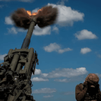 | Ukraine service members fire a shell from a M777 Howitzer from Ukrainian position in Peski toward Donetsk Source reuterscom | MR Online