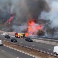 | Wildfires next to the A2 in Kent on the hottest day on record in Britain Still from video by Tim Cross | MR Online