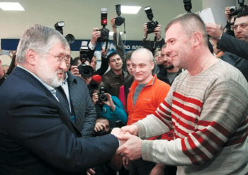 Then-Governor Kholomoisky with Yuriy Bereza, head of the Dnipro Battalion in March 2014. [Source: kyivpost.com]