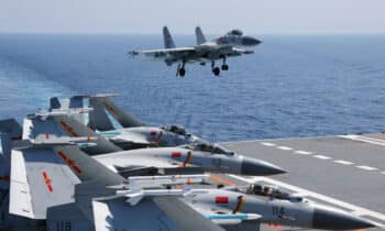 A ship-borne J-15 fighter jet prepares to land at the flight deck of the aircraft carrier Liaoning (Hull 16). Photo:China Military