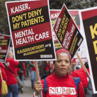 | After whistleblowing short strikes and a year of contract negotiations Kaiser mental health workers are on their first ever open ended strike They say patients shouldnt have to wait months for a therapy appointment Photo NUHW | MR Online