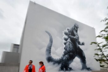 A large wall painting of Godzilla is displayed in Tokyo in June 2014 (AFP)