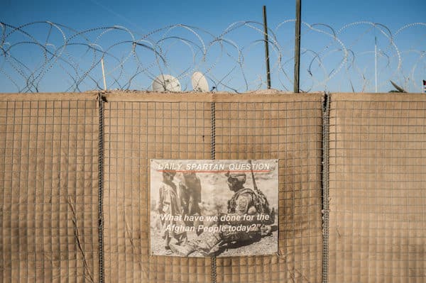 | On a Kandahar outpost a motivational poster on blast walls ringed with concertina wire walling US troops off from Afghanistan File photo | MR Online