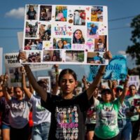 Hundreds listen to speakers at the Unheard Voices March & Rally in honor of the 21 victims of the Robb Elementary mass shooting in Uvalde, Texas, on July 10, 2022. Photo by Kaylee Greenlee Beal/Texas Observer