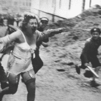 Jewish girl flees in terror in Lviv during anti-Jewish pogrom. [Source: wikipedia.org]