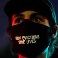  | A demonstrators mask reads Stop Evictions Save Lives during a protest in the Echo Park section of Los Angeles March 25 2021 AP PhotoMarcio Jose Sanchez | MR Online