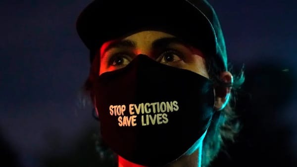 | A demonstrators mask reads Stop Evictions Save Lives during a protest in the Echo Park section of Los Angeles March 25 2021 AP PhotoMarcio Jose Sanchez | MR Online