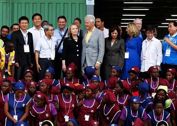 | Hillary Clinton Secretary of State and former president Bill Clinton at opening of garment factory in Haiti on October 22 2012 Photo Getty Pool | MR Online