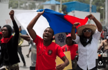 | Haitian Protestors Hold Russian Flag During Demonstration Source gannet cdncom | MR Online