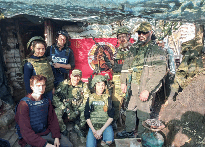 | The author with Pyatnashka commanders at outpost near Avdeevka Donetsk Peoples Republic Source Photo courtesy of Eva Bartlett | MR Online