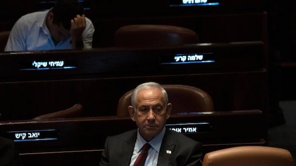 | Israeli Prime Minister designate Benjamin Netanyahu pauses during a session after Yariv Levin was selected as Speaker of the Knesset on 13 December 2022 AP | MR Online