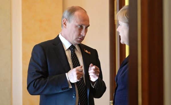 MR Online | Russian President Vladimir Putin with then German Chancellor Angela Merkel on May 10 2015 at the Kremlin Russian Government | MR Online