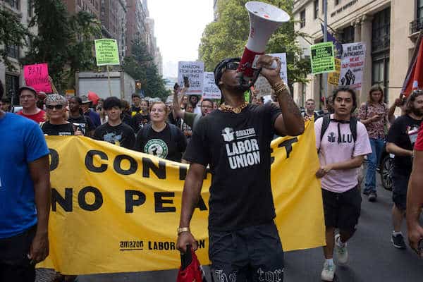 | Chris Smalls a leader of the Amazon Labor Union leads a march of Starbucks and Amazon workers and their allies to the homes of their CEOs to protest union busting on Labor Day September 5 2022 in New York City New York ANDREW LICHTENSTEIN CORBIS VIA GETTY IMAGES Truthout | MR Online