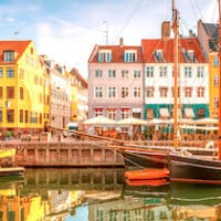 Nyhavn, Copenhagen. Denmark and the other Nordic countries lead in economic security measures and score near the top in equality, happiness and life satisfaction. Shutterstock, by LaMiaFotografia.