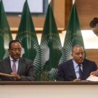 On November 7, 2022, Redwan Hussien Rameto (2nd L), representative of the Ethiopian government, and Getachew Reda (2nd R), representative of the Tigray People's Liberation Front (TPLF), signed a peace agreement in Pretoria, South Africa. Photo: Alet Pretorius/Xinhua