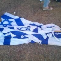 FLAGS AT PEACE NOW RALLY, MAY 27, 2017, RABIN SQUARE, TEL AVIV. PHOTO BY PHIL WEISS.