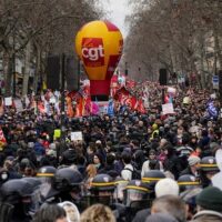 demonstrators and riot police