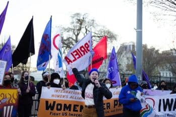 | Katie Comfort of International Womens Alliance spoke on March 4 in front of the White House calling on organizations to join IWA and the anti imperialist womens movement credit Hannah Ballesteros | MR Online