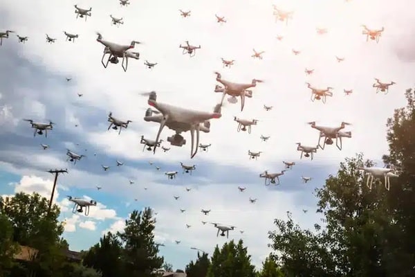 MR Online | Drone swarms The Pentagons massive budget includes a new project the Autonomous Multi domain Adaptive Swarms of Swarms AMASS to launch automated coordinated attacks by swarms of thousands of many types of drones that operate in the air on the ground and in the water | MR Online
