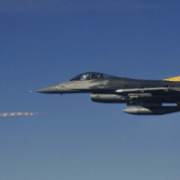 An Air Force F-16 Fighting Falcon fires an AIM-9M Sidewinder missile during training at Tyndall Air Force Base, Florida, March 10, 2021. [Photo: Department of Defense/Air Force 1st Lt. Savanah Bray ]