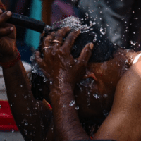 A man tries to cool off in New Delhi, India on May 23, 2023. (Photo: Kabir Jhangiani/NurPhoto via Getty Images)