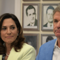 Texas Congressman Michael McCaul with Florida Congresswoman Maria Elvira Salazar speak amidst backdrop of photos of Bay of Pigs invaders at Miami roundtable event on July 10, designed to mobilize support for regime change. [Source: floridapress.com]